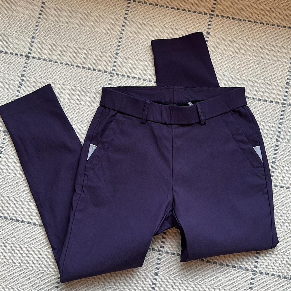 KJUS Ikala 7/8 trigging size 36 Small plum color Like New!